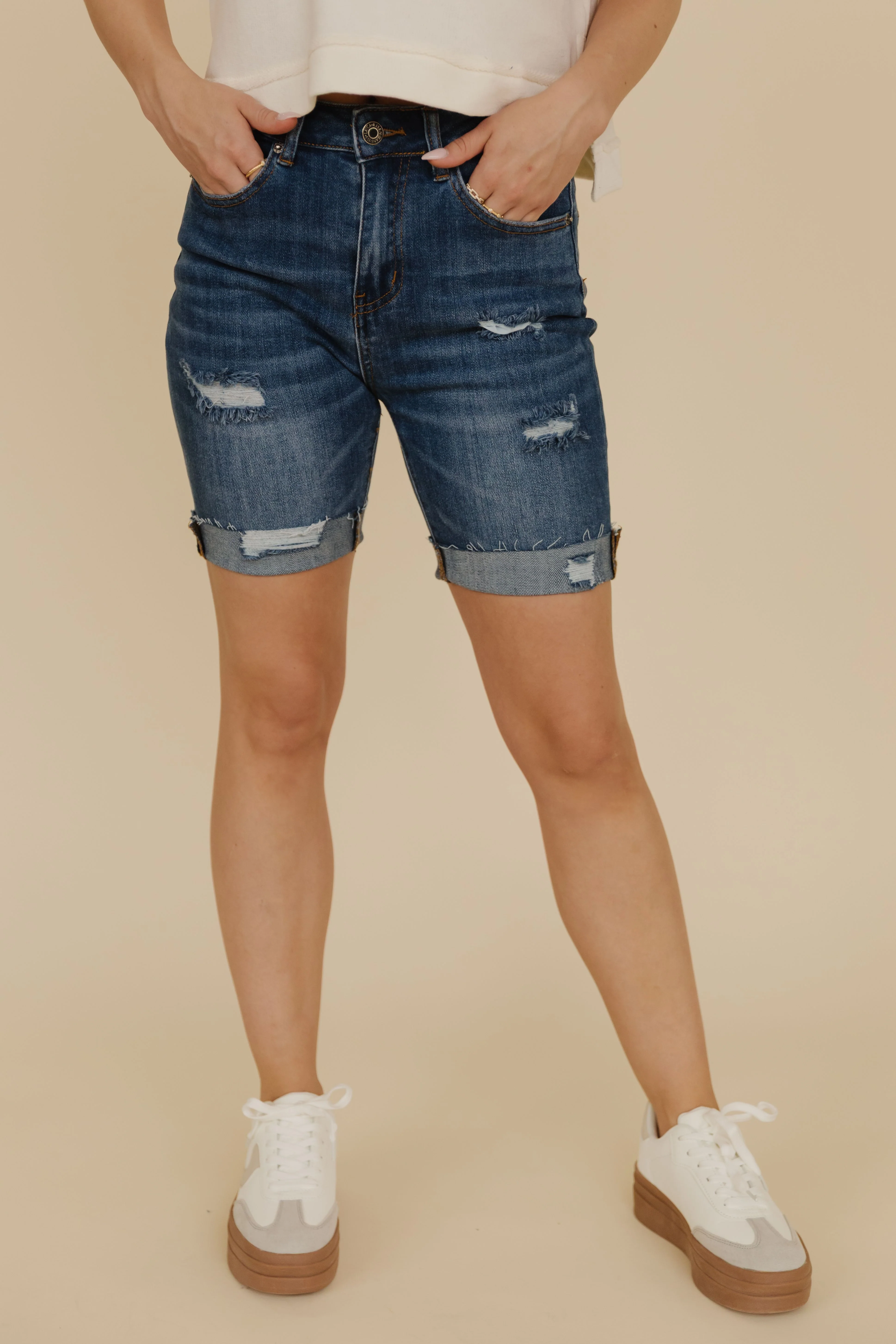 THE SCOUT HIGH RISE DISTRESSED SHORTS IN DARK DENIM - Payfeveri